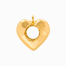 Load image into Gallery viewer, Gold pierced heart-shaped pendant on a white background
