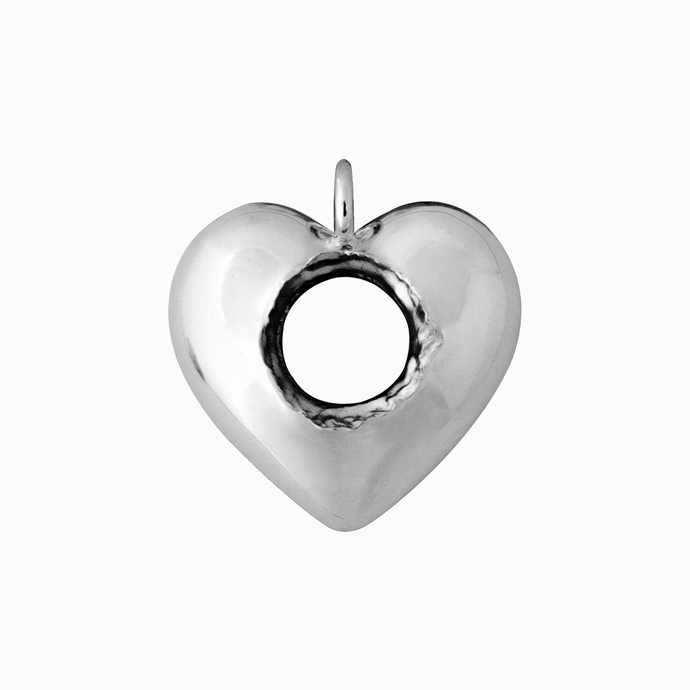 Silver pierced heart-shaped pendant on a white background
